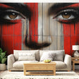 Street art wallpaper with dramatic face design showcased in a modern industrial loft living room setting