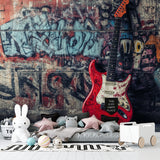 Music room transformed with street art guitar wallpaper