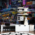 Street art sports car wallpaper in modern teen bedroom, neon lighting creates cool gaming atmosphere