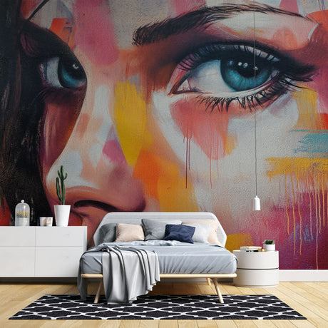 Street art mural wallpaper creating bold impact in modern living room with high ceilings and minimal furniture