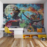 Urban pop art wallpaper transforming a creative studio space with modern furniture