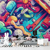 Street art graffiti wallpaper showcased in modern living room with gray sofa and plant accents