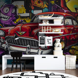 Graffiti wall mural with classic car in teen bedroom showing scale