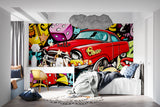 Street art wallpaper with vintage red car bringing urban style to a modern living room