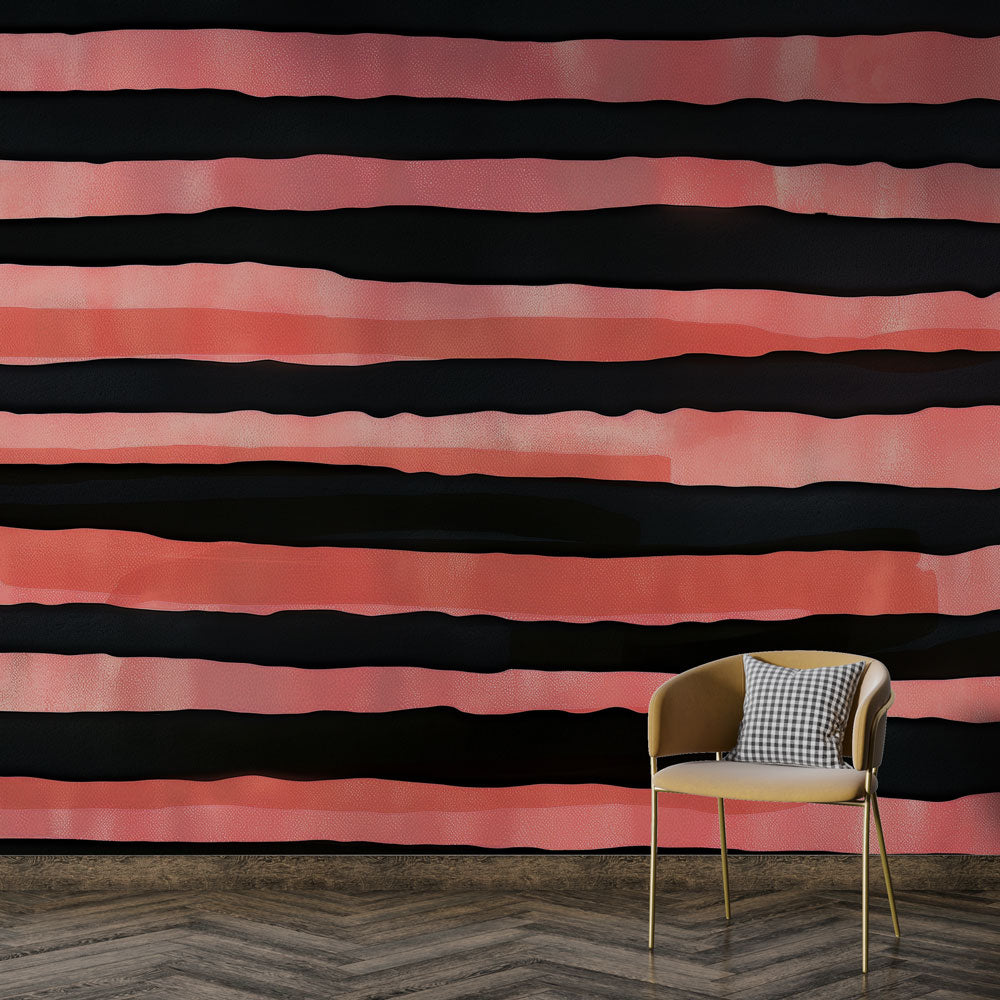 Modern striped wallpaper in coral and black creating a bold statement wall in a minimalist living room with grey furniture