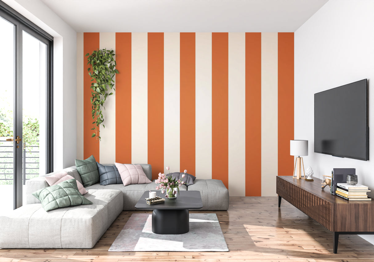 Dining room with bold orange striped wall mural adding warmth and sophistication
