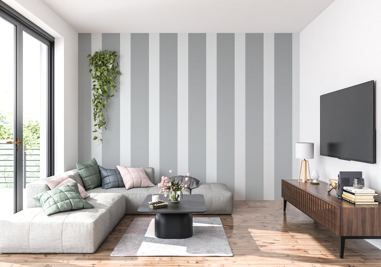 Modern bedroom featuring grey and white vertical striped wallpaper