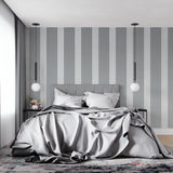 Grey striped wallpaper accent wall in minimalist hallway