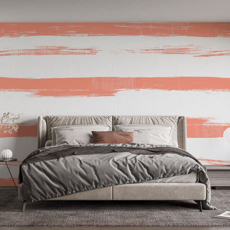 Modern pink striped wallpaper creating a fresh look in a bright living room with minimalist furniture