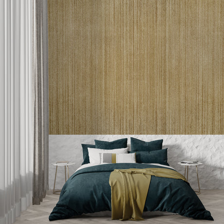 Golden bamboo stripe wallpaper in modern living room creating warm, rich atmosphere with natural light