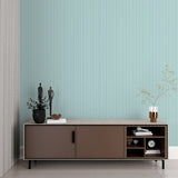 Mint green vertical stripe wallpaper making a bedroom feel calm and organized