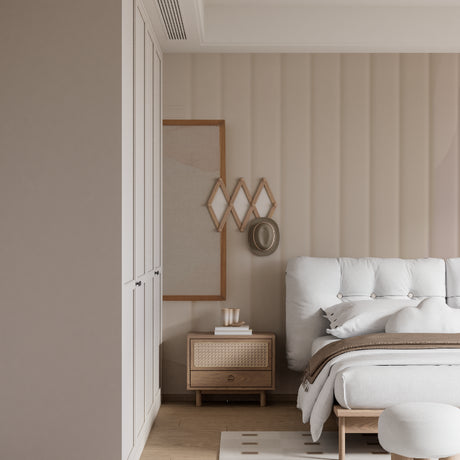 Modern striped wallpaper in bright living room with minimal furniture showing vertical beige pattern