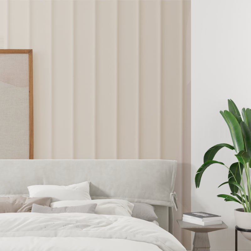 Modern beige striped wallpaper in home office with natural lighting
