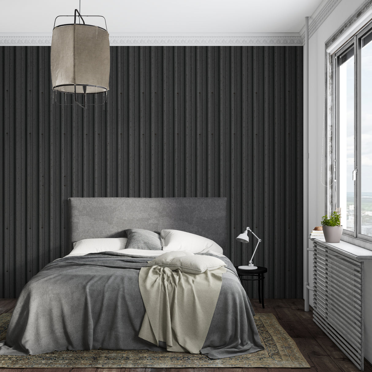 Modern black striped wallpaper in a minimalist living room showing vertical pattern impact