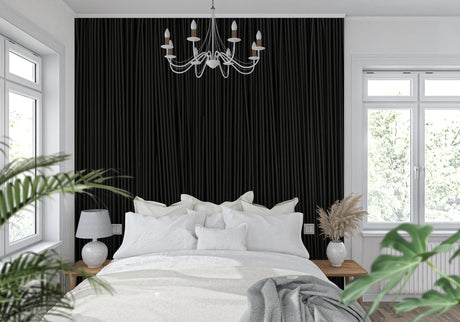 Modern black wood stripe wallpaper in a minimalist living room with tall windows and contemporary furniture