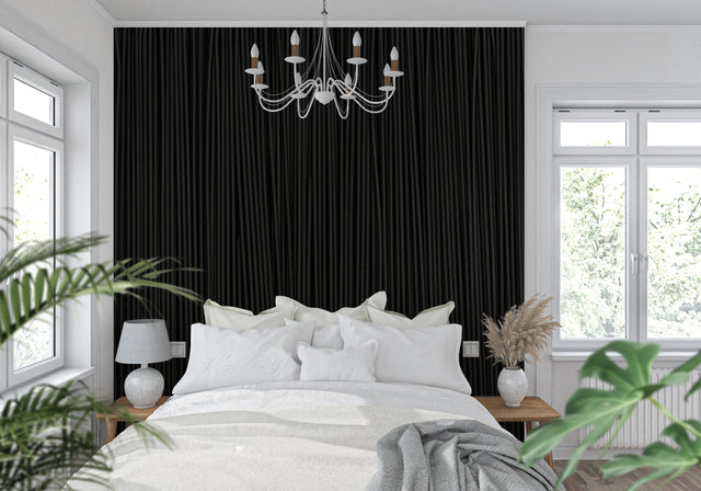 Modern black wood stripe wallpaper in a minimalist living room with tall windows and contemporary furniture