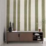 Green striped wallpaper in a bright modern living room, creating an airy and spacious feel