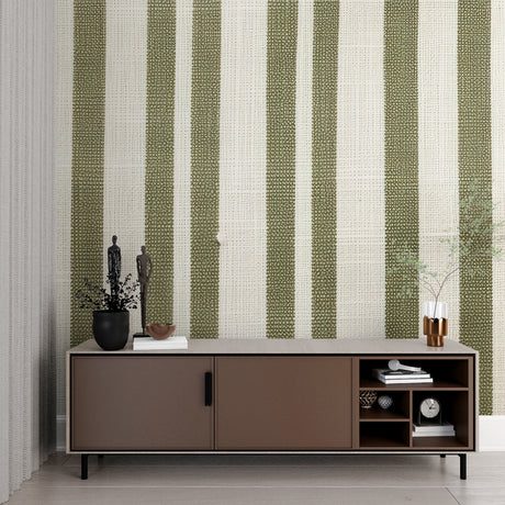 Green striped wallpaper in a bright modern living room, creating an airy and spacious feel