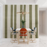 Modern dining room featuring sage green striped wallpaper with natural lighting