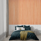 Vertical orange stripes adding energy to a modern bedroom space