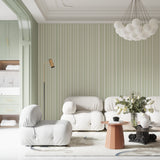 Vertical striped wallpaper in sage green making a bedroom feel taller