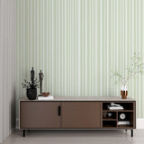 Minimalist hallway showcasing vertical green striped wallpaper pattern