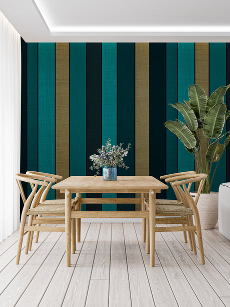 Modern teal and gold striped wallpaper in a bright living room with contemporary furniture