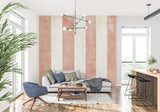 Striped wallpaper creating height in a cozy living room with natural lighting