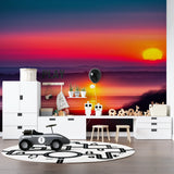 Two-sun sunset wall mural creating depth in home office space