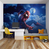 Superhero mural in a playroom showing Spider-Man swinging across moonlit scene