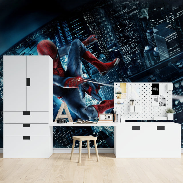 Spider-Man wall mural brings superhero action to a modern kids bedroom with blue accent lighting