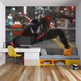 Superhero mural in gaming room showing Spider-Man swinging through city lights
