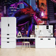Spider-Man wallpaper mural styled in modern teen bedroom with gaming setup and LED lighting