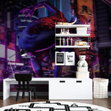 Superhero mural adding punch to home theater space with dark walls
