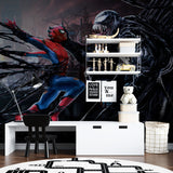 Spider-Man battle scene mural wallpaper showcased in a modern teen bedroom with gaming setup