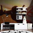 Superhero wallpaper bringing Marvel magic to a modern kids bedroom with gaming setup