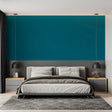 Teal wall mural in modern living room showcasing clean lines and contemporary furniture