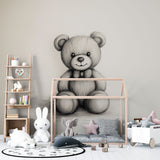 Black and white teddy bear wallpaper creating a cozy atmosphere in a modern nursery with neutral decor