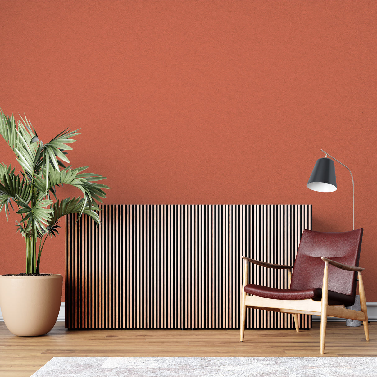 Minimalist home office featuring terracotta accent wall with modern furniture