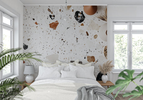 Modern terrazzo wallpaper in a bright living room, white and terracotta stone pattern adding texture to contemporary space