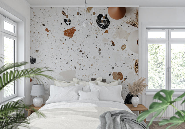 Modern terrazzo wallpaper in a bright living room, white and terracotta stone pattern adding texture to contemporary space