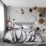 Contemporary terrazzo mural in stylish bathroom, bringing warmth through scattered stone elements