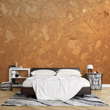 Cork texture wallpaper creating warm ambiance in modern living room with minimalist furniture