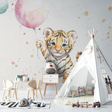 Baby tiger wallpaper creating a cozy reading nook in a children's bedroom