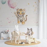 Watercolor tiger mural in a modern playroom with natural lighting