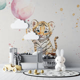 Baby tiger wall mural bringing charm to a daycare reading area