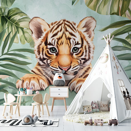 Baby tiger cub wallpaper creating a magical atmosphere in a modern nursery with mint green walls