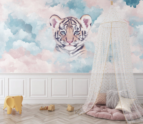 Tiger wallpaper mural in a bright nursery with white furniture, showing the soft pastel clouds effect