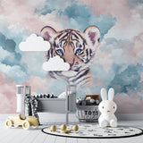 Playroom setup with tiger mural wallpaper creating a peaceful reading corner