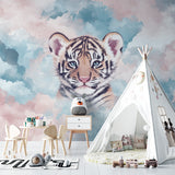 Baby room with tiger wallpaper mural showcasing the soft cloud background
